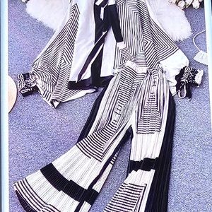 NbyNancy two piece black and white set size large NWT poncho top,…